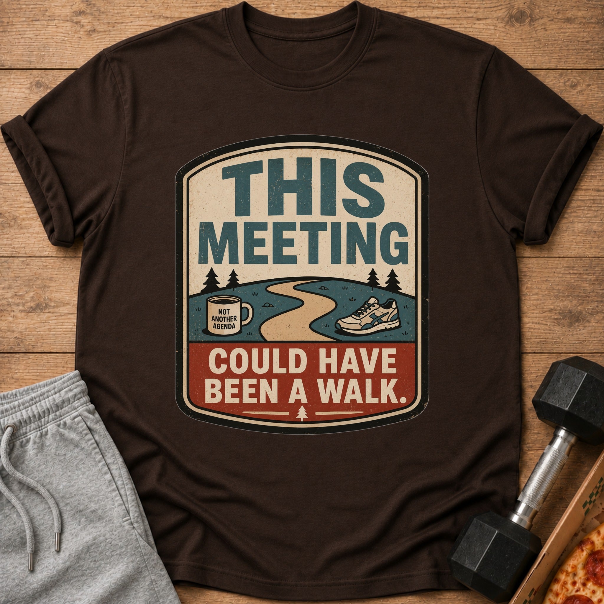 T-shirt graphic with text "This Meeting Could Have Been A Walk."
