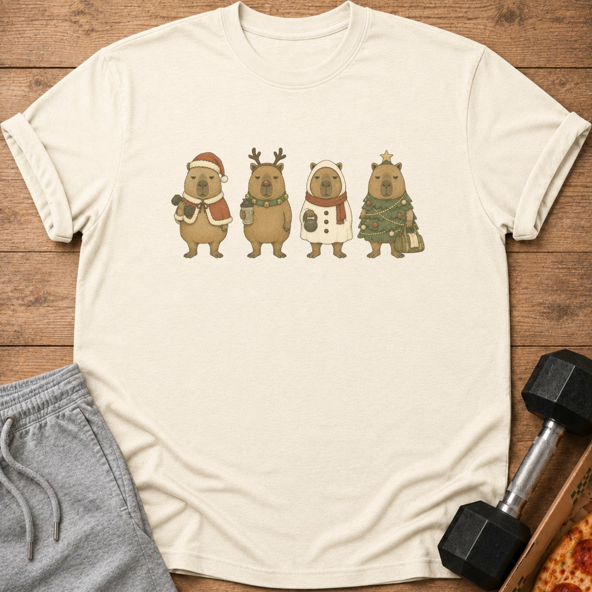 Four capybaras in holiday costumes: Santa, reindeer, snowman, and Christmas tree.