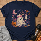 Sleepy ghost with headband sits by pumpkin and weights under crescent moon.