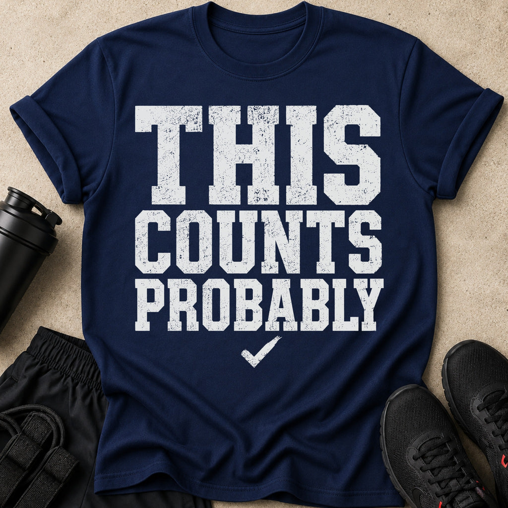Navy t-shirt with white text reading "THIS COUNTS PROBABLY" and a checkmark.