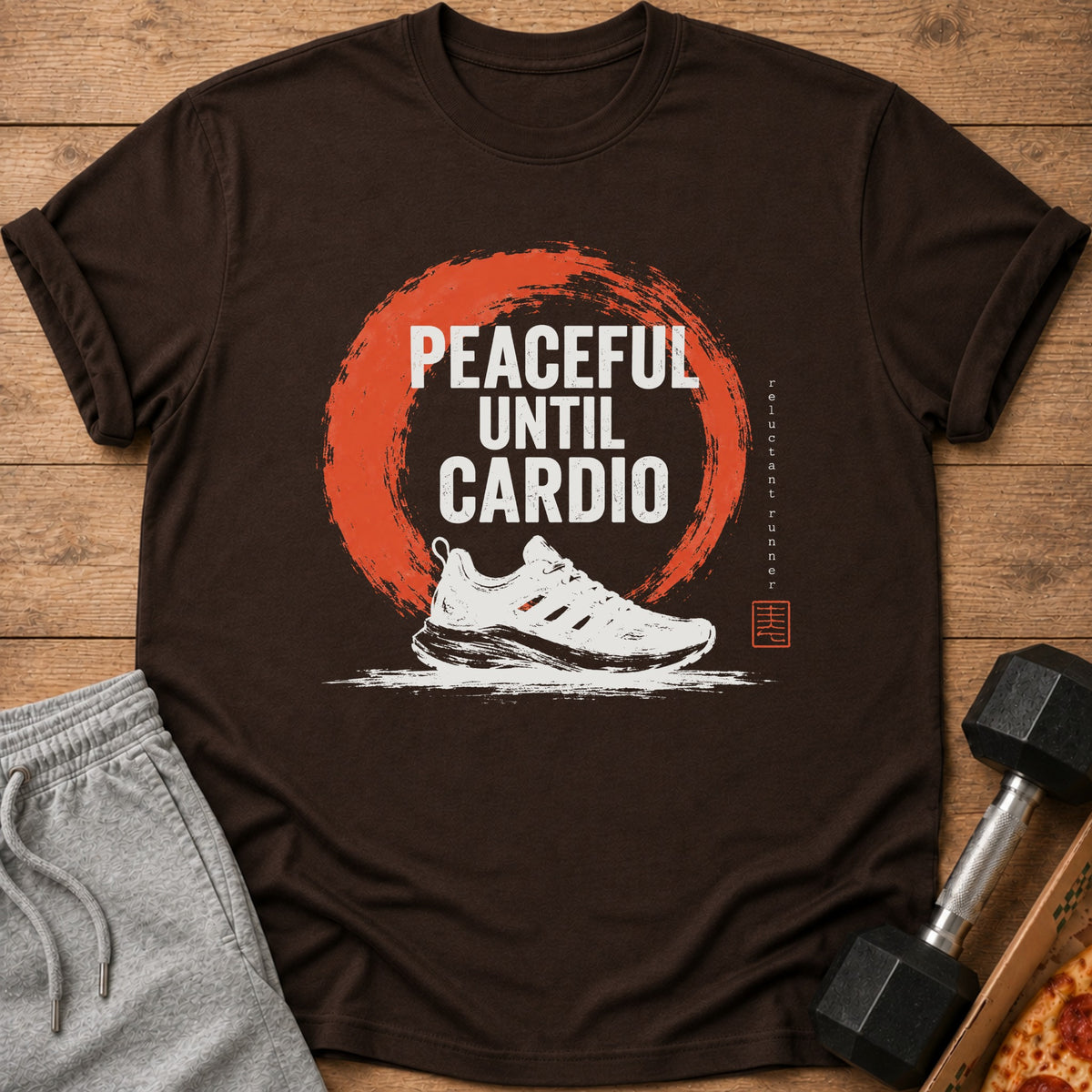 Brown t-shirt with "Peaceful Until Cardio" graphic and a running shoe.