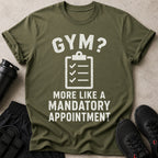 Green t-shirt with text "GYM? MORE LIKE A MANDATORY APPOINTMENT".