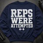 Navy sweatshirt with white distressed text "REPS WERE ATTEMPTED" and dumbbell graphic.