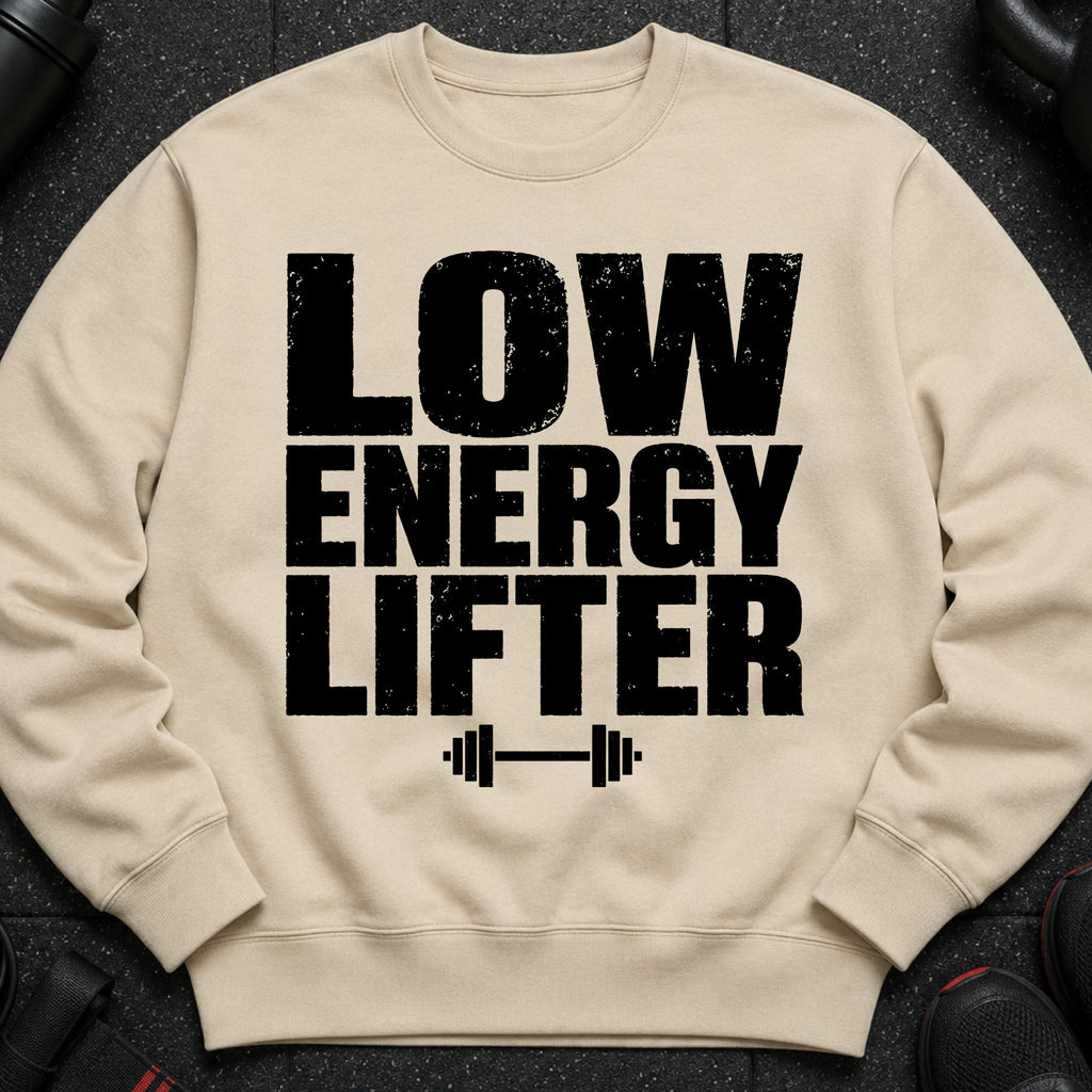 Cream sweatshirt with bold black text "LOW ENERGY LIFTER" and barbell graphic.