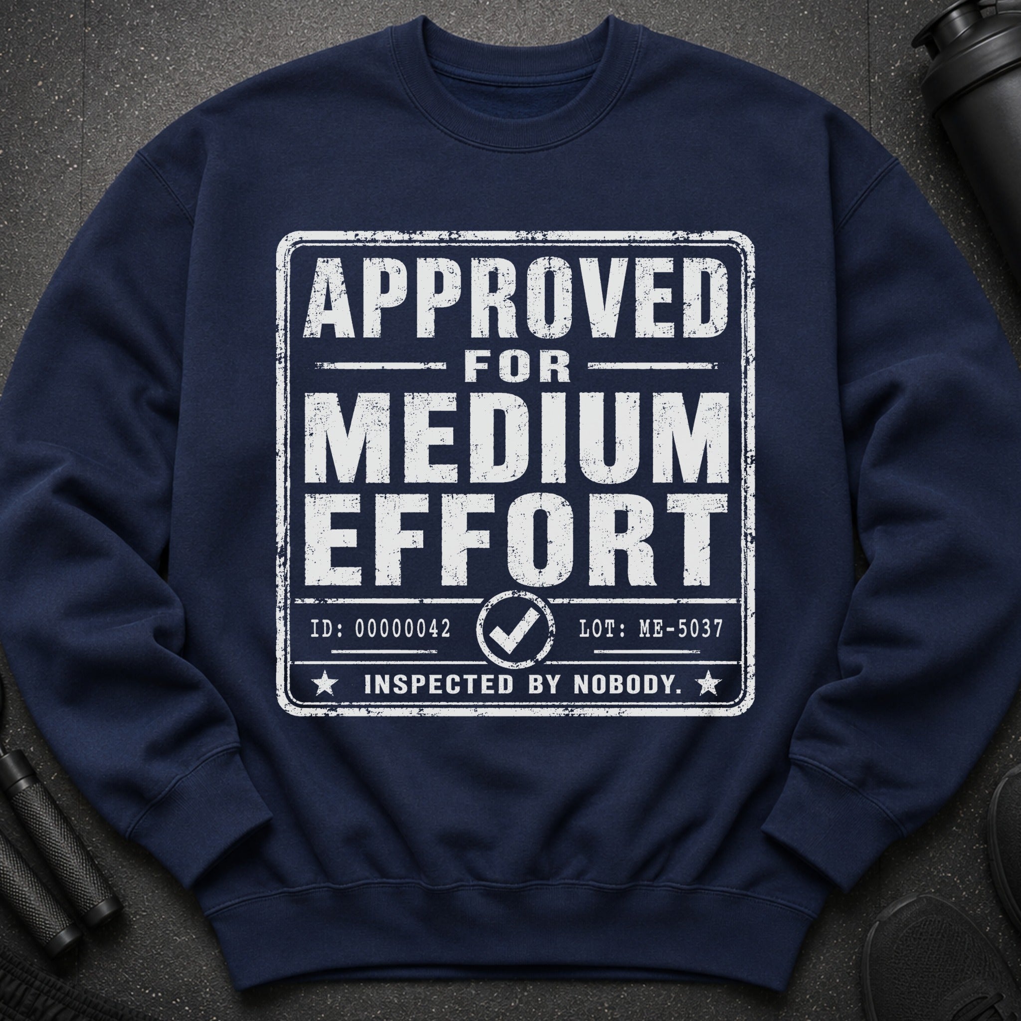 Navy sweatshirt with "APPROVED FOR MEDIUM EFFORT" graphic and checkmark.