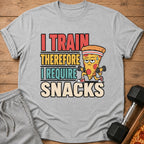Grey t-shirt with cartoon pizza lifting dumbbells and text "I TRAIN THEREFORE I REQUIRE SNACKS".