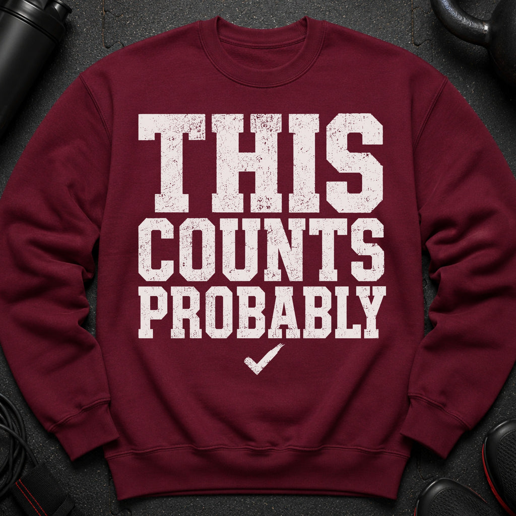 Maroon sweatshirt with distressed white text "THIS COUNTS PROBABLY" and a checkmark.
