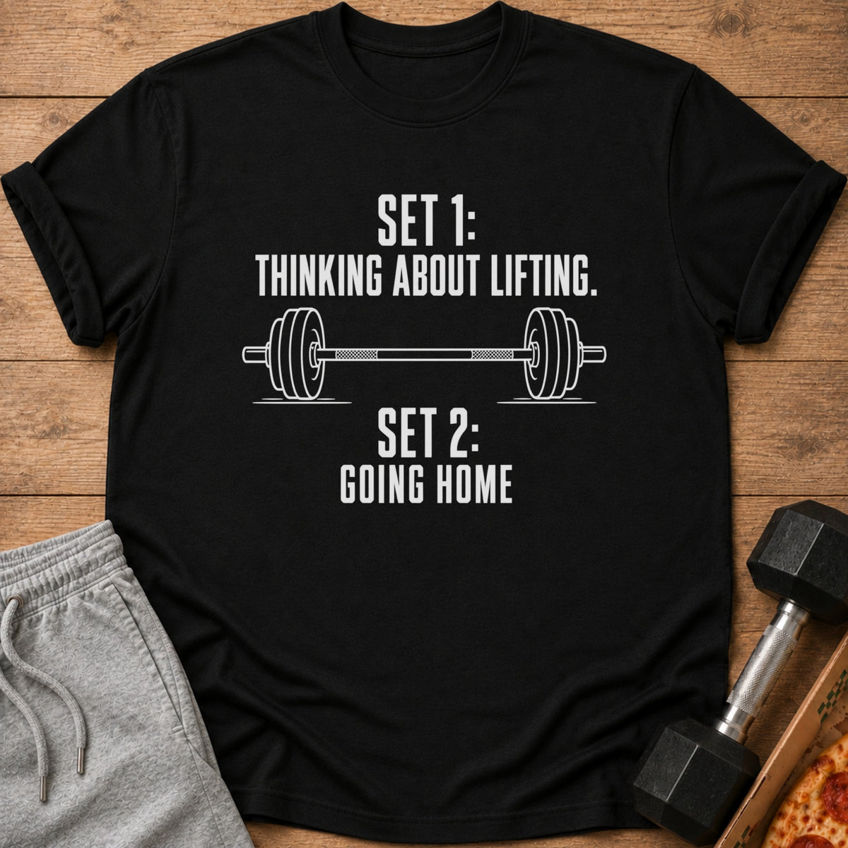Black t-shirt with "SET 1: THINKING ABOUT LIFTING. SET 2: GOING HOME."