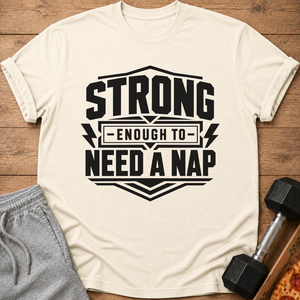 Cream t-shirt with black text "STRONG ENOUGH TO NEED A NAP".