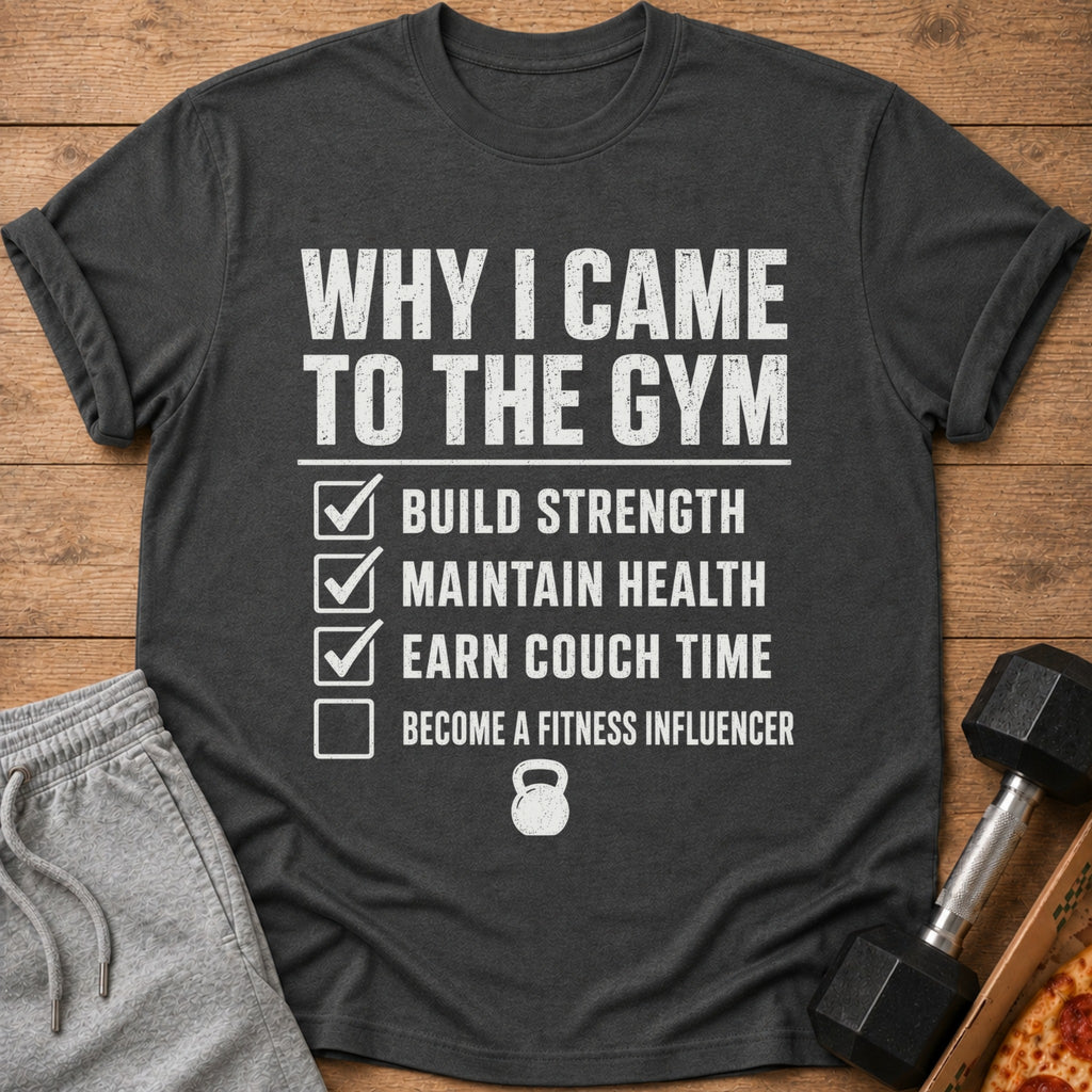Dark gray t-shirt with "Why I Came to the Gym" list including build strength, maintain health, earn couch time.