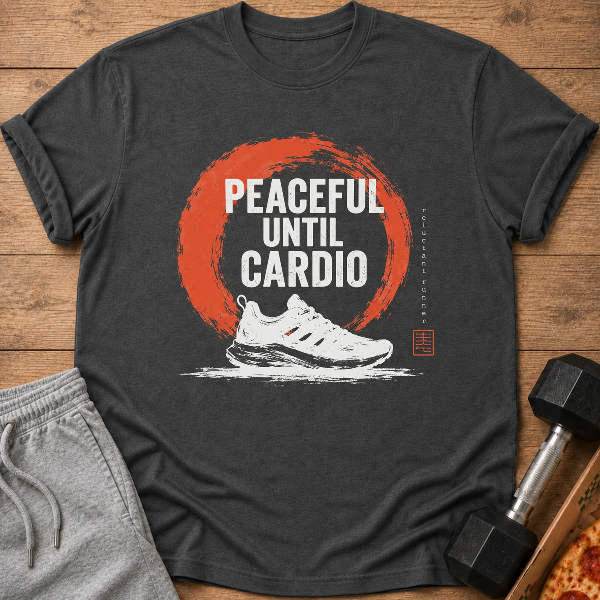 T-shirt with "PEACEFUL UNTIL CARDIO" text, a running shoe, and a dumbbell.