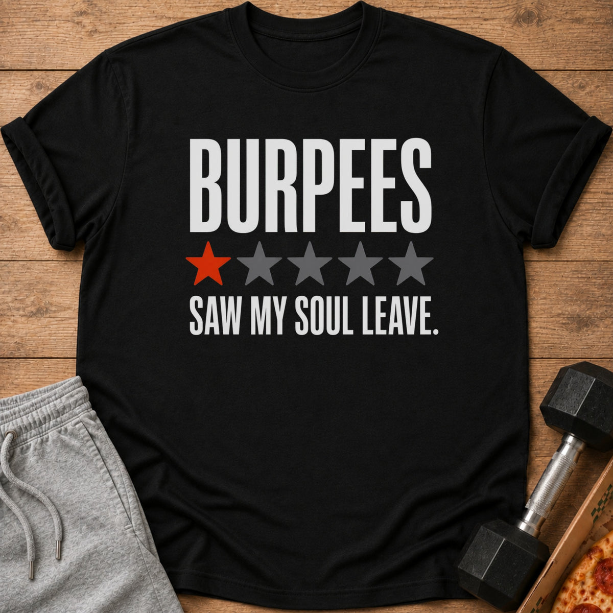 Black t-shirt with "BURPEES SAW MY SOUL LEAVE" text and one red star.