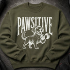 Green sweatshirt with white distressed graphic of a happy dog lifting a dumbbell.