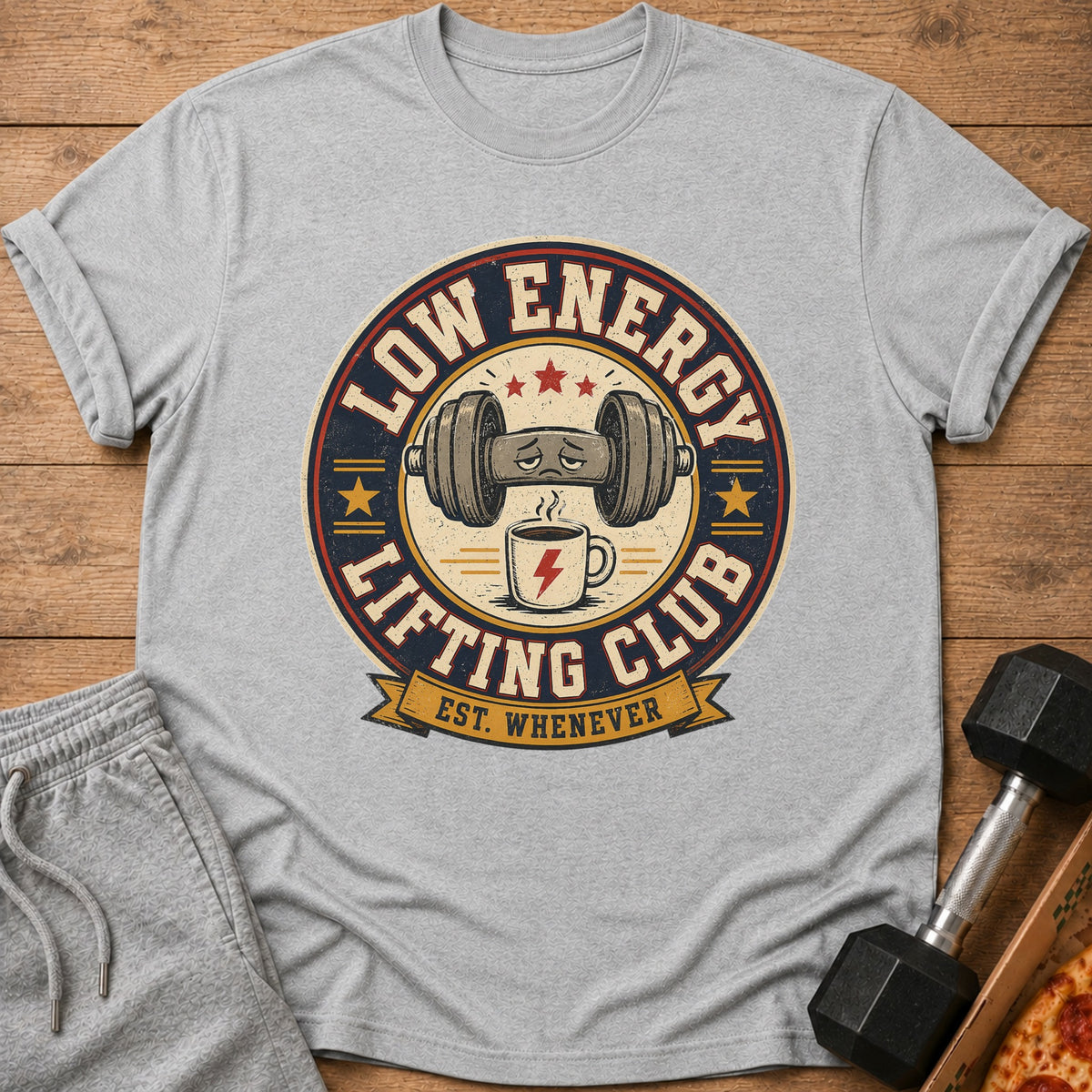 Grey t-shirt with "Low Energy Lifting Club Est. Whenever" graphic featuring a tired dumbbell and coffee.