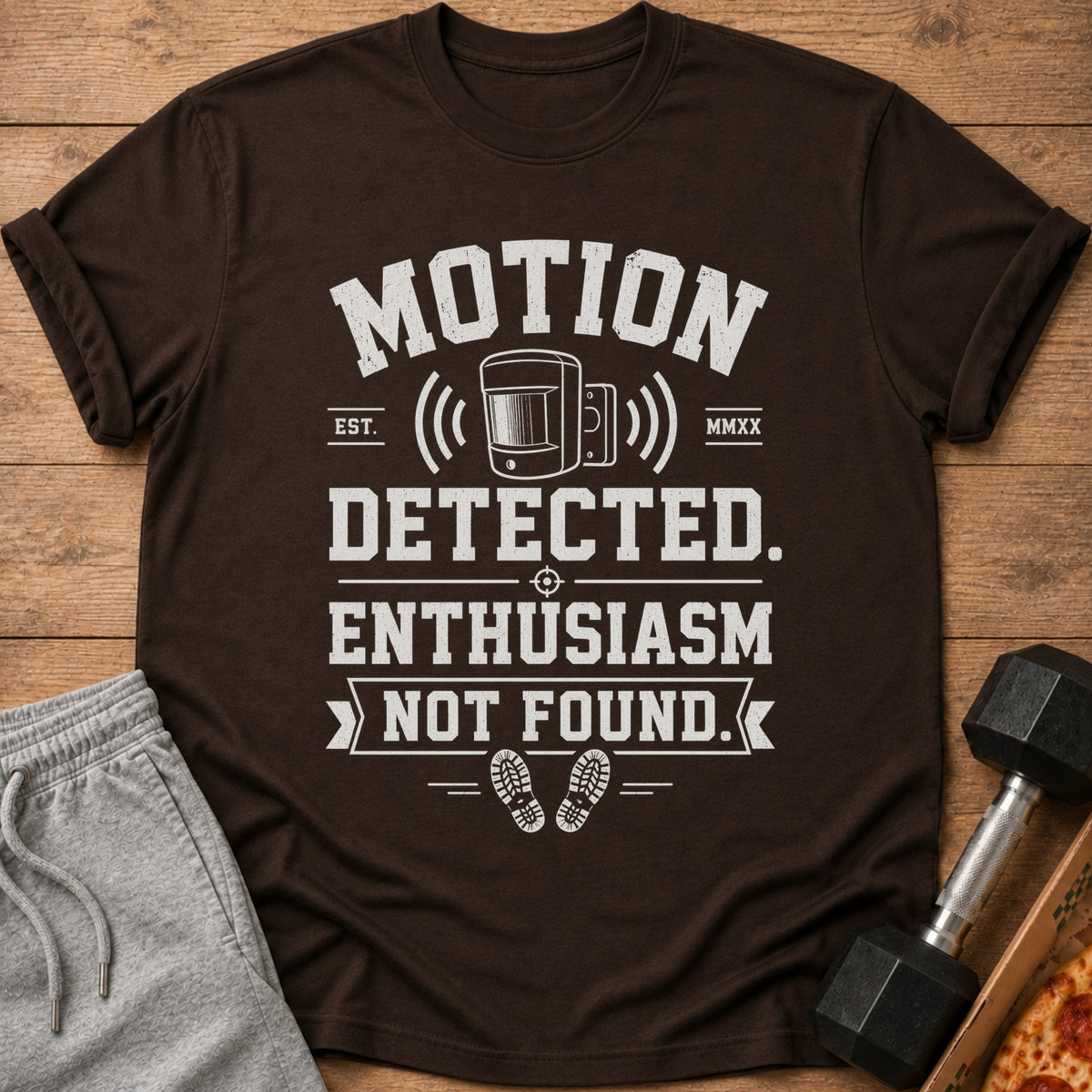 Brown t-shirt with white text: MOTION DETECTED. ENTHUSIASM NOT FOUND.