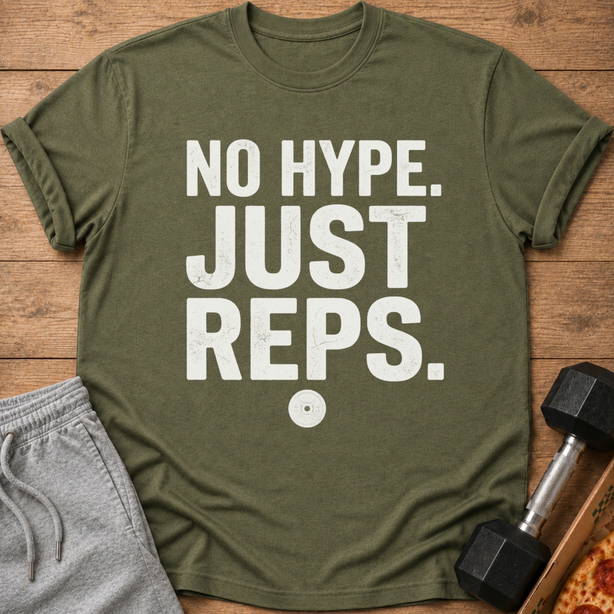 Green t-shirt with white text "NO HYPE. JUST REPS." and a small weight plate graphic.