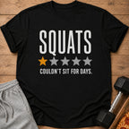 Black t-shirt with "SQUATS" and "COULDN'T SIT FOR DAYS." text.