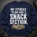 Navy sweatshirt with "MY FITNESS PLAN HAS A SNACK SECTION" text and a plate of snacks.