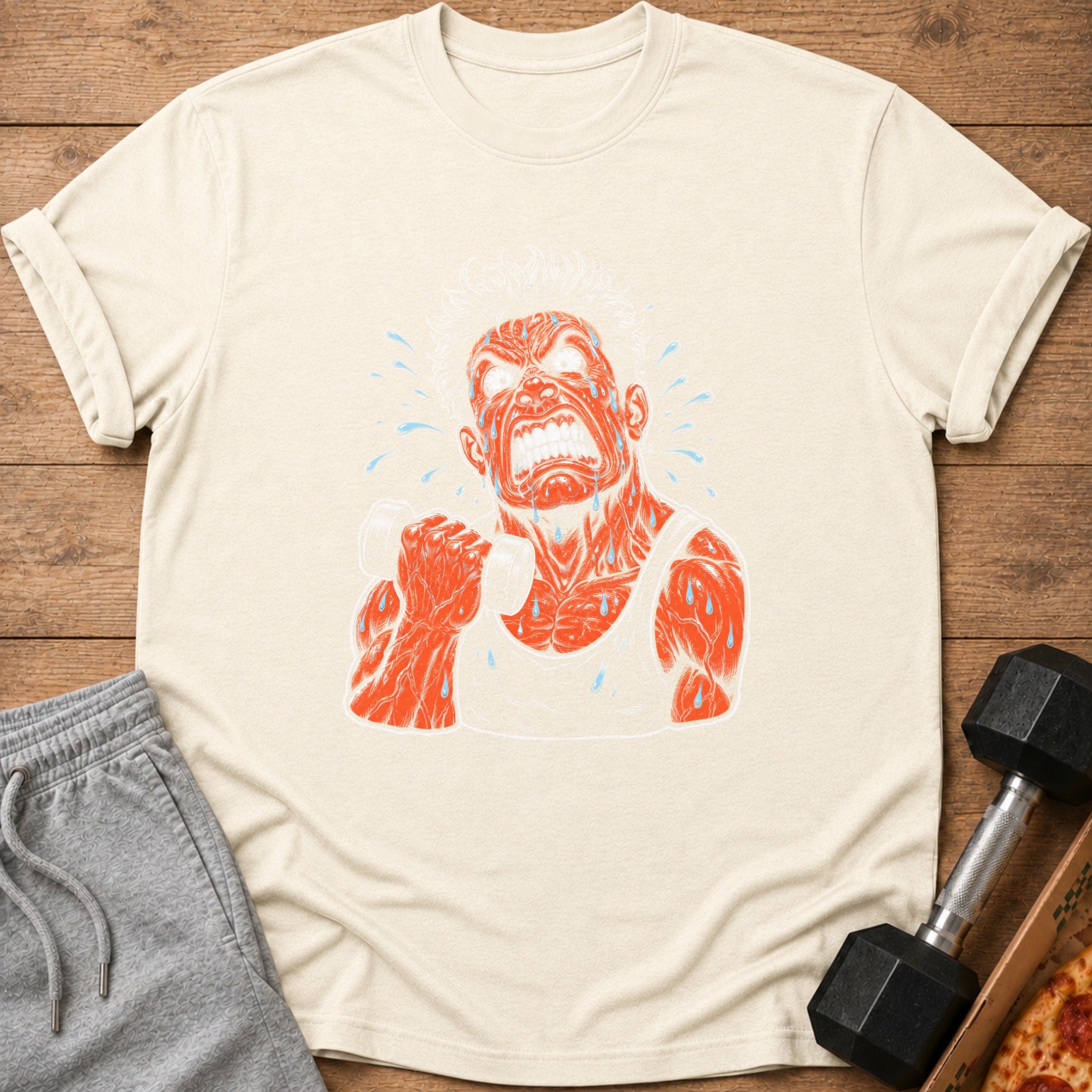 Cream t-shirt with artwork of a sweating man lifting a dumbbell.