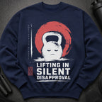 Navy sweatshirt with a grumpy kettlebell graphic and "Lifting in Silent Disapproval" text.