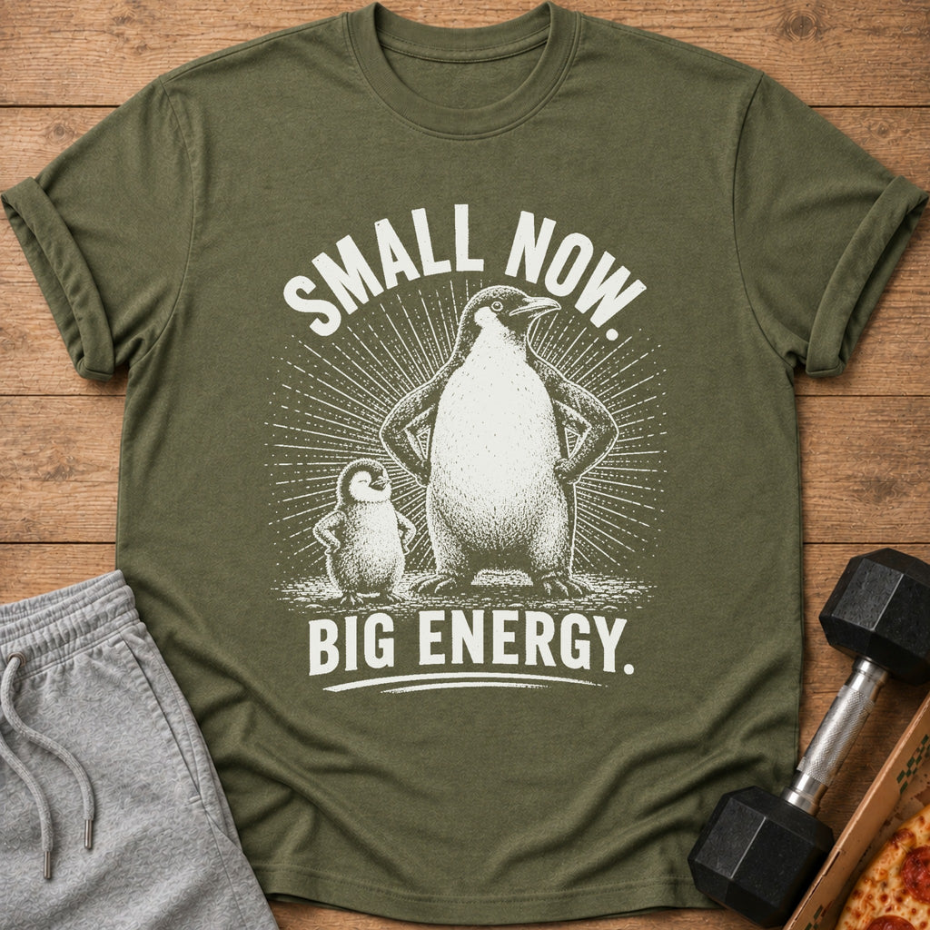 Green t-shirt with penguins and text "SMALL NOW. BIG ENERGY."