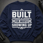 Navy sweatshirt with white text "BUILT FOR MOSTLY SHOWING UP"