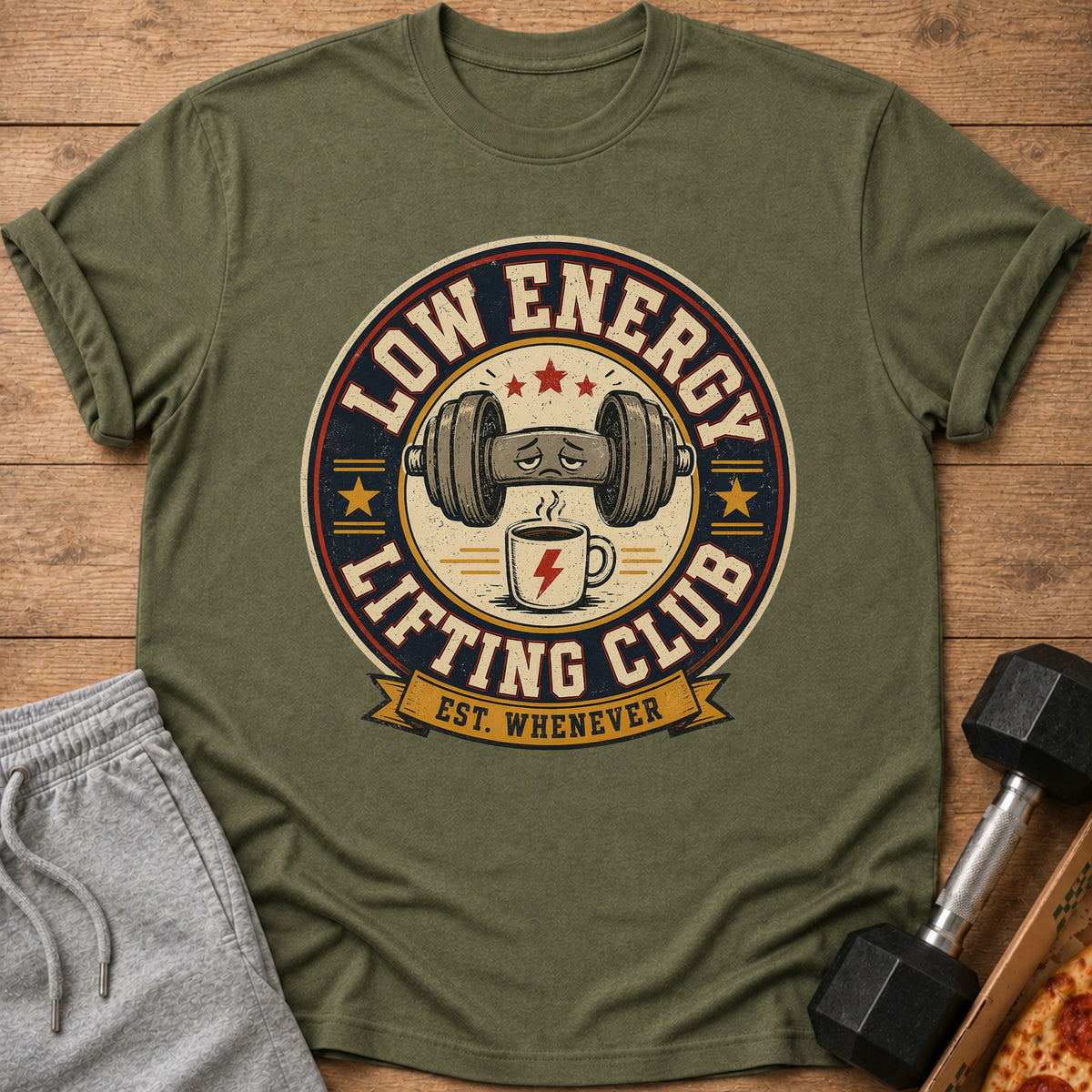 Olive green t-shirt with "Low Energy Lifting Club Est. Whenever" graphic and cartoon dumbbell.