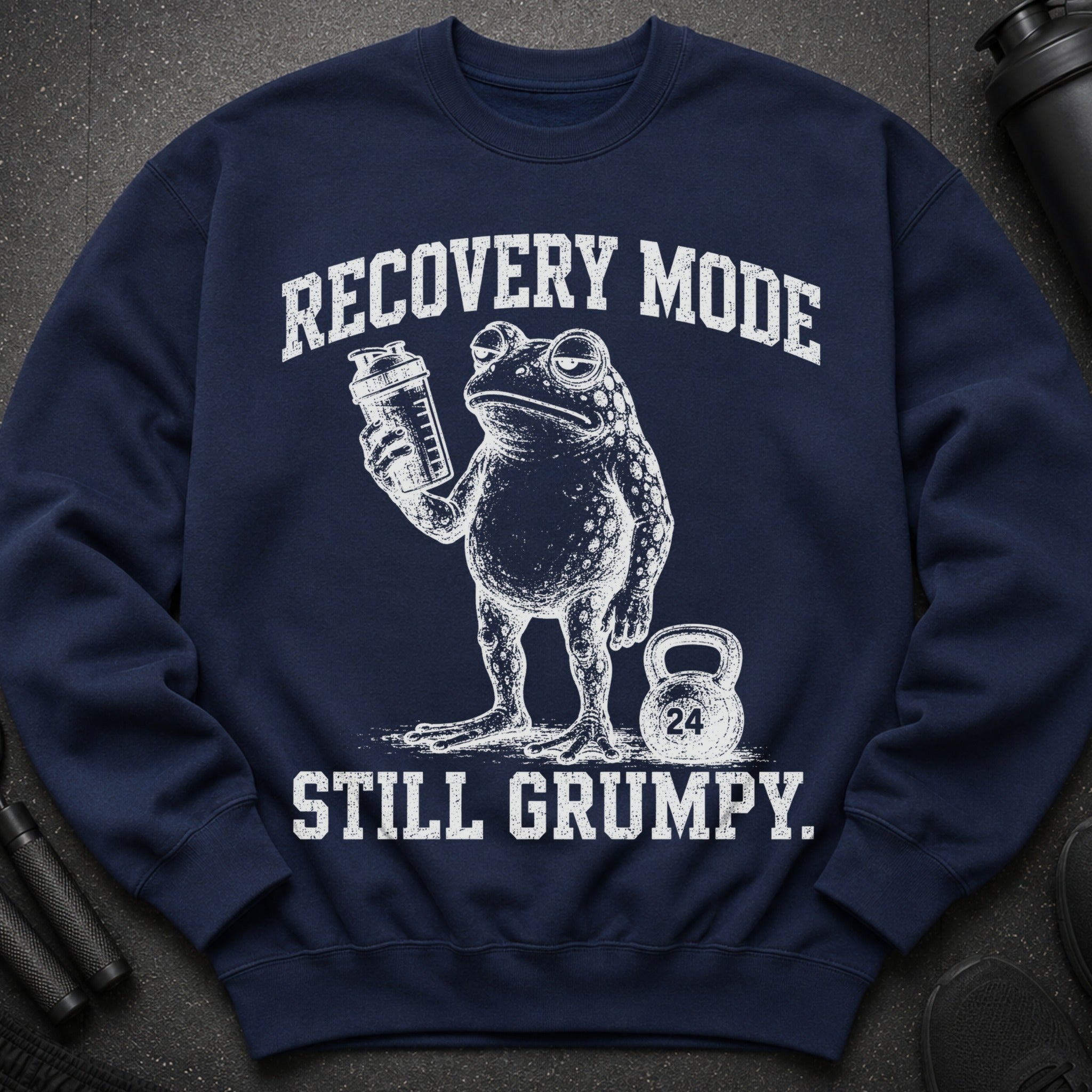 Navy sweatshirt with a grumpy toad holding a shaker and "RECOVERY MODE STILL GRUMPY" text.
