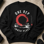 Black sweatshirt with "ONE REP INNER PEACE" and barbell graphic.