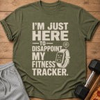 Green t-shirt with text "I'M JUST HERE TO DISAPPOINT MY FITNESS TRACKER."