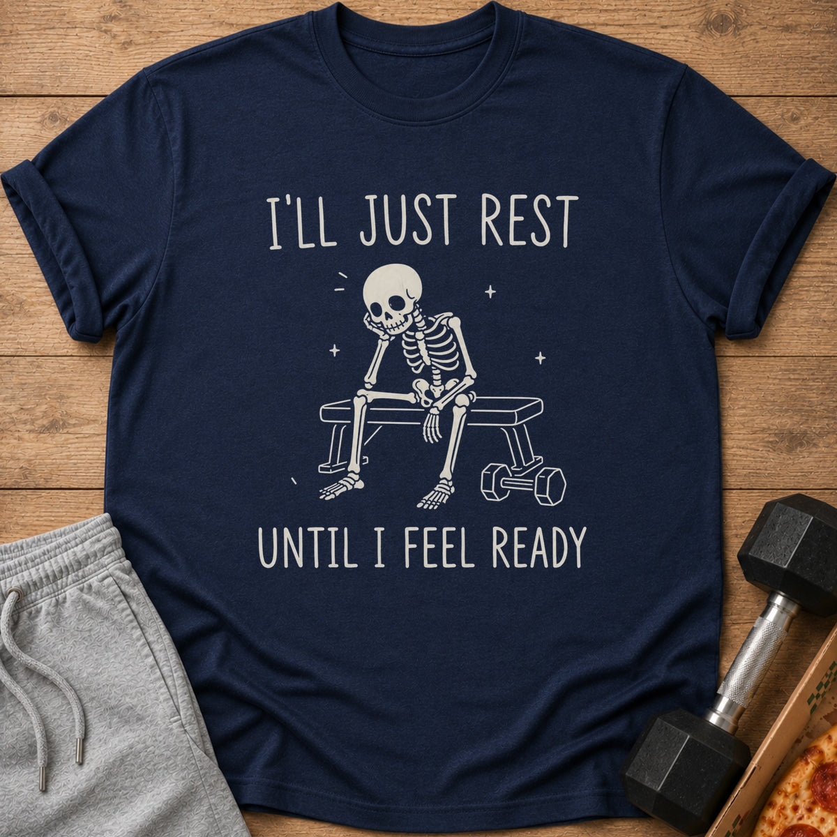 Navy t-shirt with skeleton on bench and text "I'LL JUST REST UNTIL I FEEL READY".