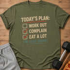 Green t-shirt with text "TODAY'S PLAN: WORK OUT, COMPLAIN, EAT A LOT (IN THAT ORDER)".