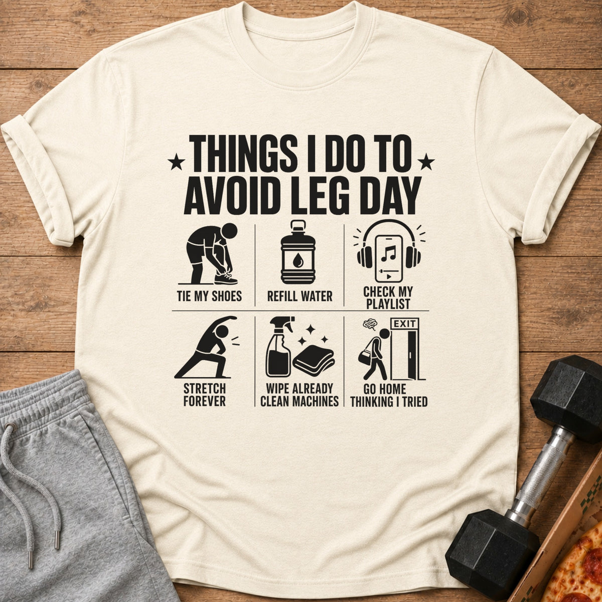 T-shirt with text "Things I Do To Avoid Leg Day" and illustrative icons.