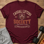 Maroon t-shirt with "Casual Lifters Society" text and a sloth graphic.