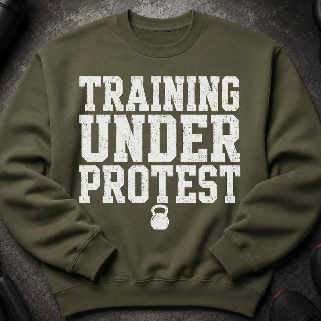 Olive green sweatshirt with "TRAINING UNDER PROTEST" and a kettlebell graphic.