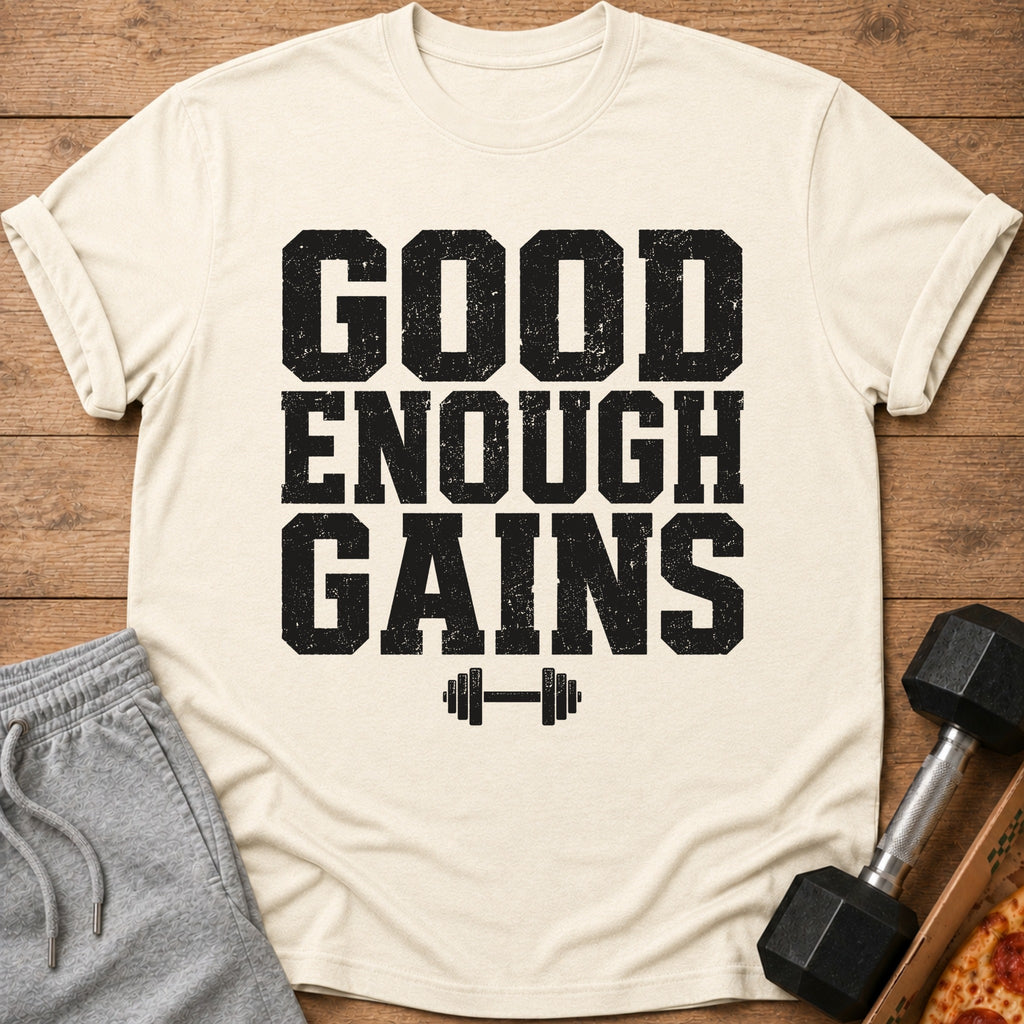 Cream t-shirt with "GOOD ENOUGH GAINS" text and barbell graphic.