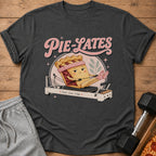 T-shirt graphic of a pie on a reformer machine with text "Pie-Lates".