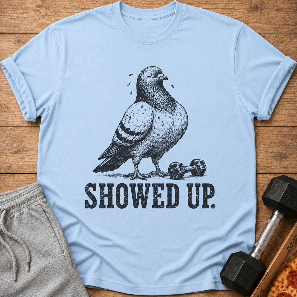 Light blue t-shirt with a black sketch of a sweating pigeon next to a dumbbell, text reads "SHOWED UP."