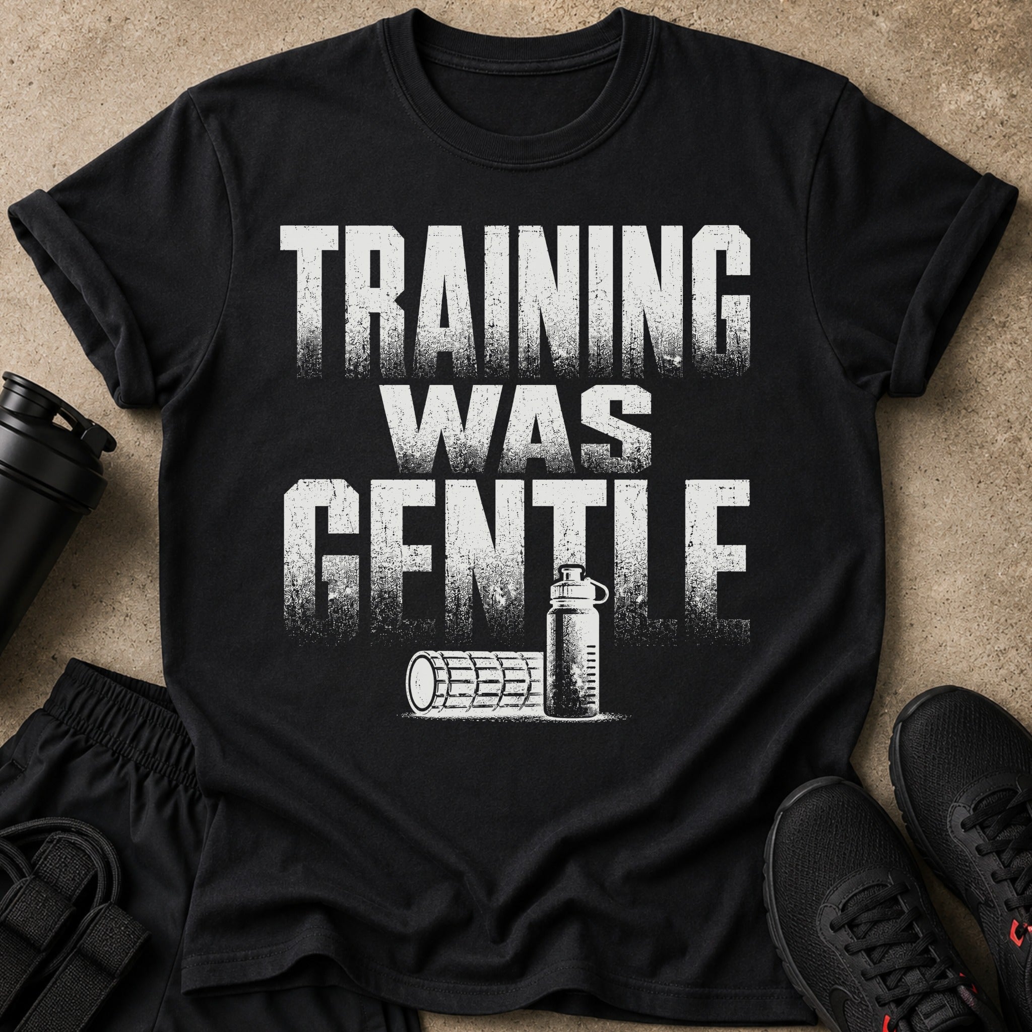 Black t-shirt with "TRAINING WAS GENTLE" text and gym equipment graphics.
