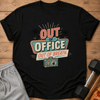 Black t-shirt with "Out of Office. Out of Breath." graphic featuring a suitcase.