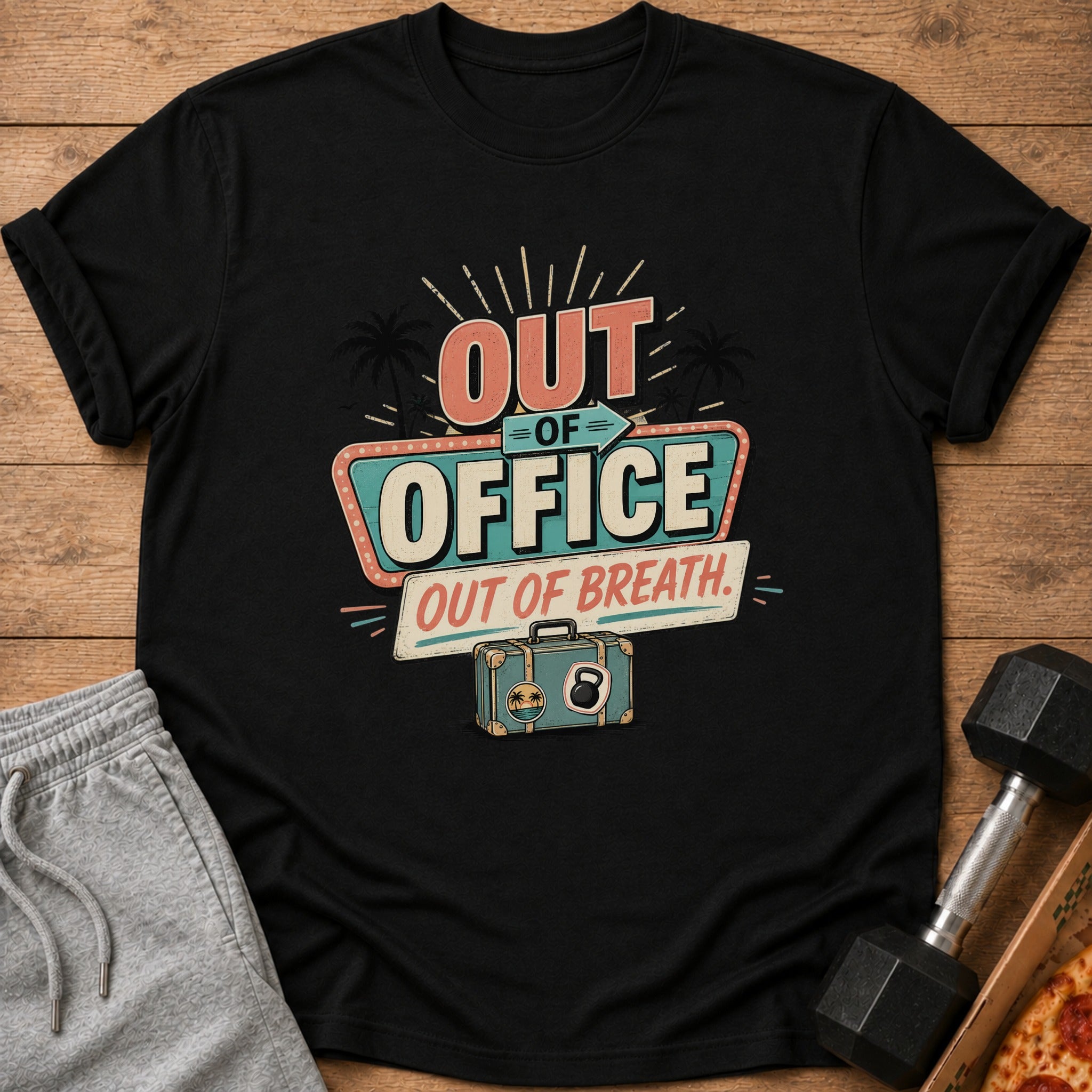 Black t-shirt with "Out of Office. Out of Breath." graphic featuring a suitcase.