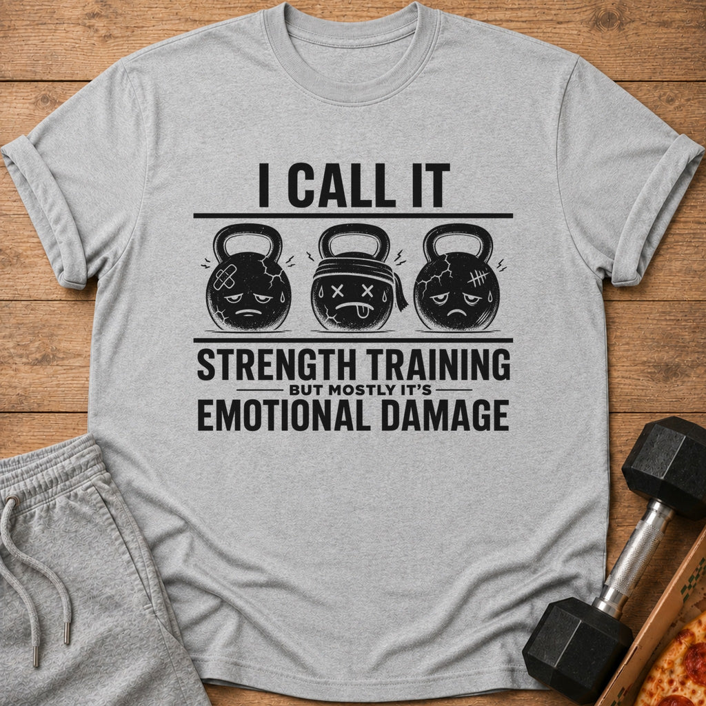 Gray t-shirt with kettlebells and text "I CALL IT STRENGTH TRAINING BUT MOSTLY IT'S EMOTIONAL DAMAGE".