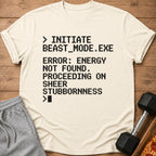 Light beige t-shirt with black text about beast mode and stubbornness.