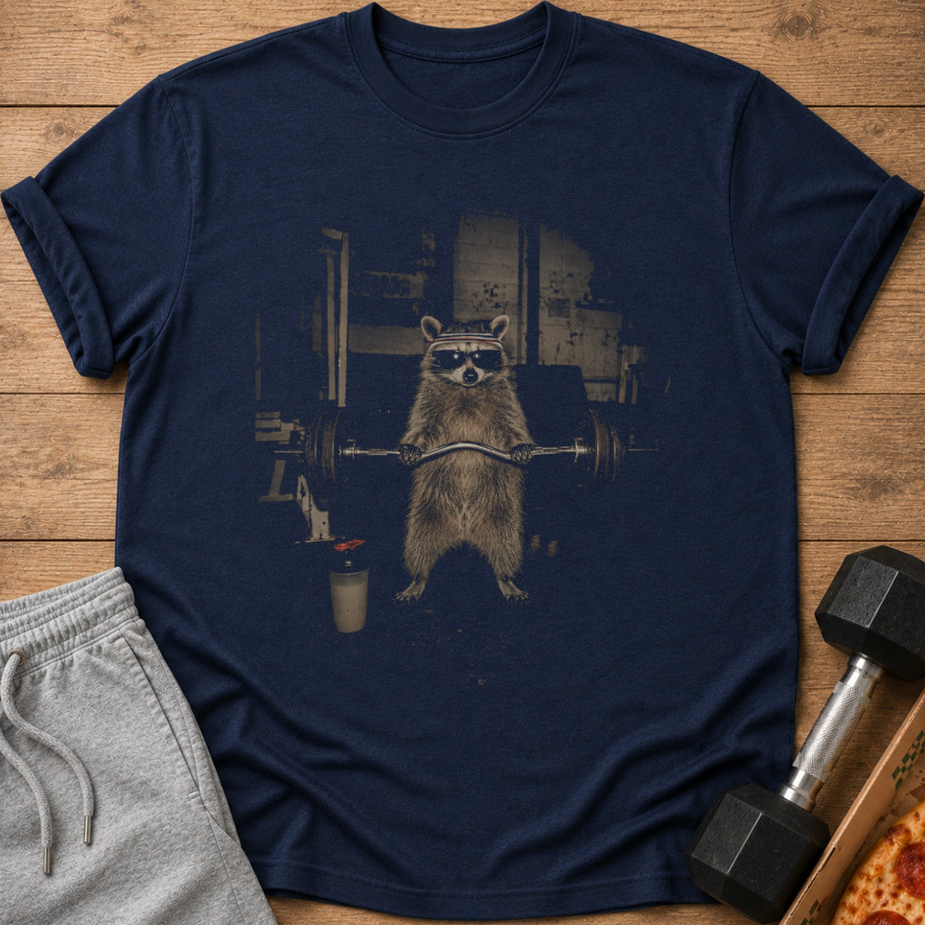 Navy t-shirt with a graphic of a raccoon lifting weights in a gym.