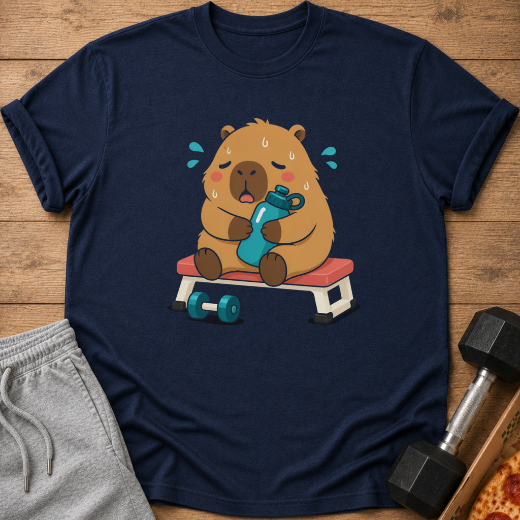 Dark blue t-shirt with cartoon capybara sitting on bench, holding water bottle.