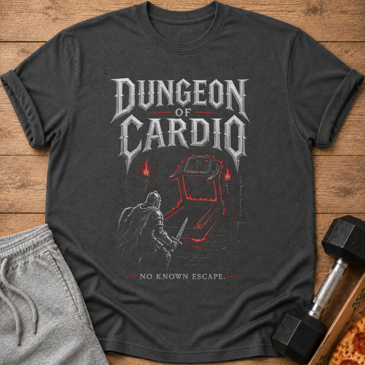 Dark grey t-shirt with "Dungeon of Cardio" text and knight facing a glowing treadmill.