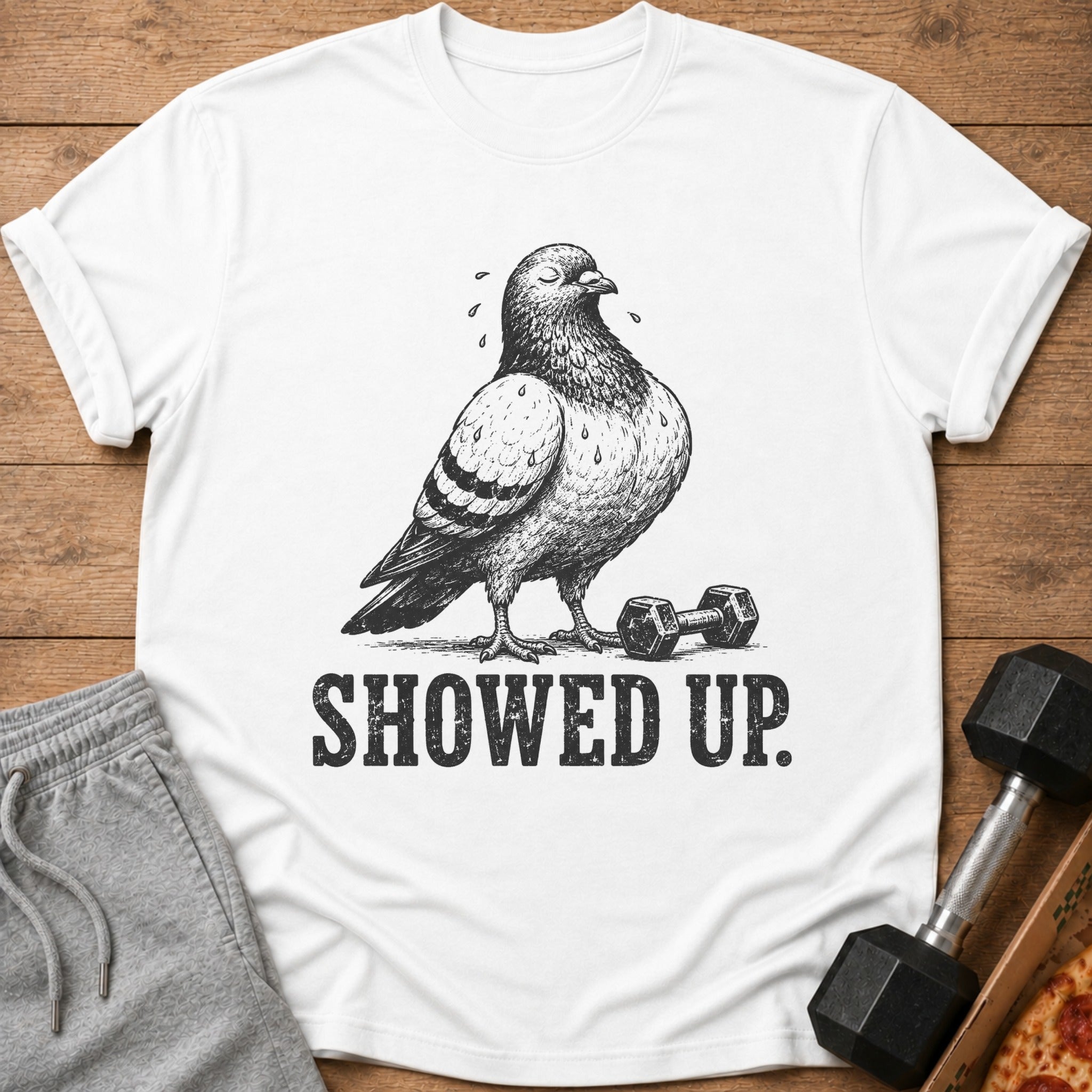 White t-shirt with pigeon graphic and "SHOWED UP." text.