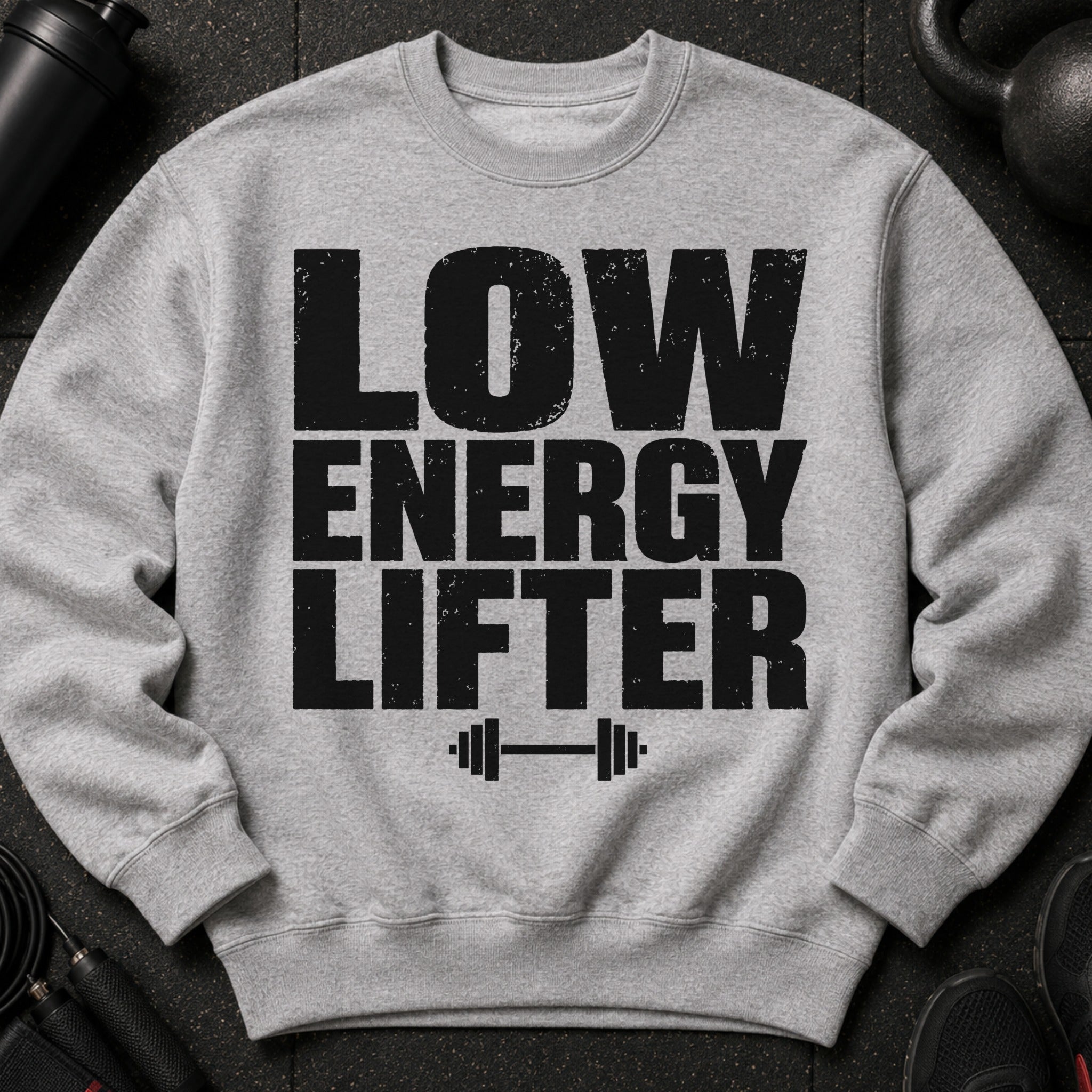 Grey sweatshirt with black distressed text "LOW ENERGY LIFTER" and a barbell graphic.