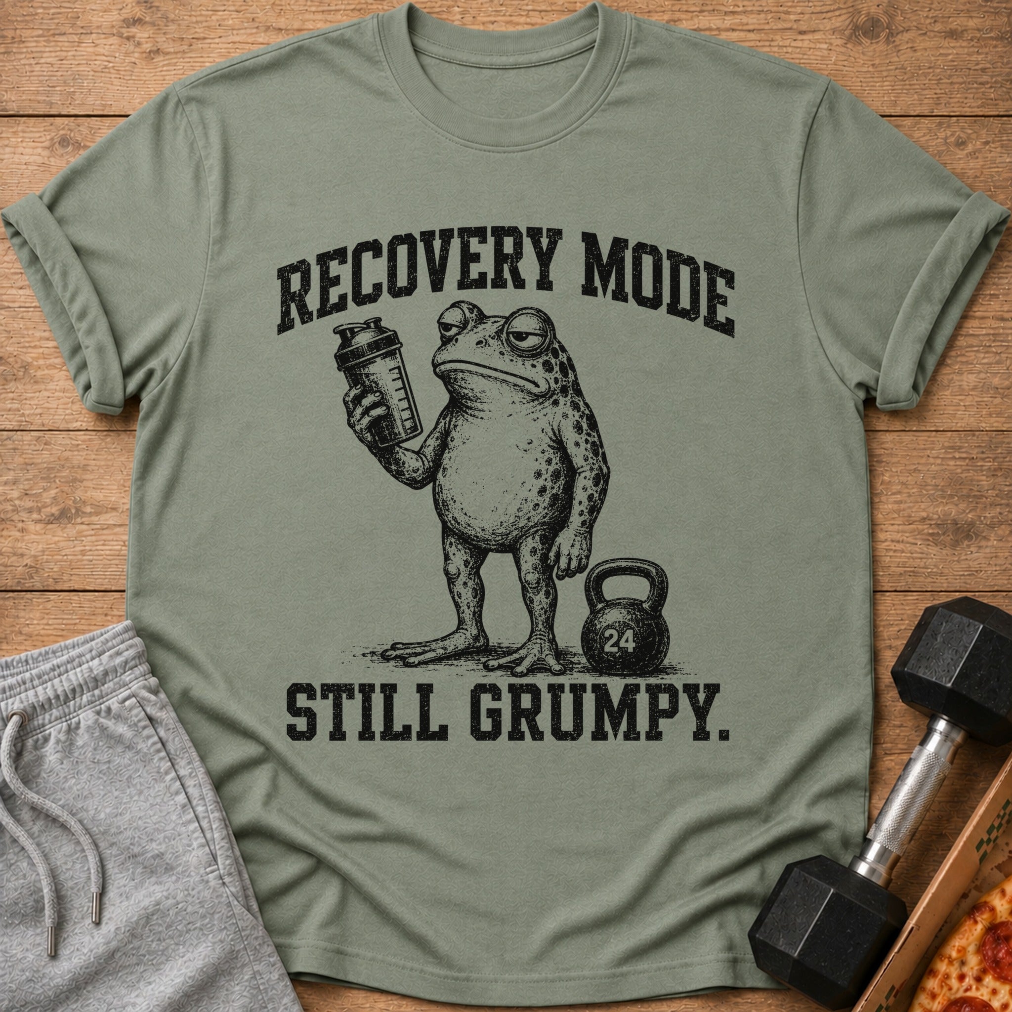 T-shirt with grumpy frog holding shaker, "Recovery Mode Still Grumpy" text.