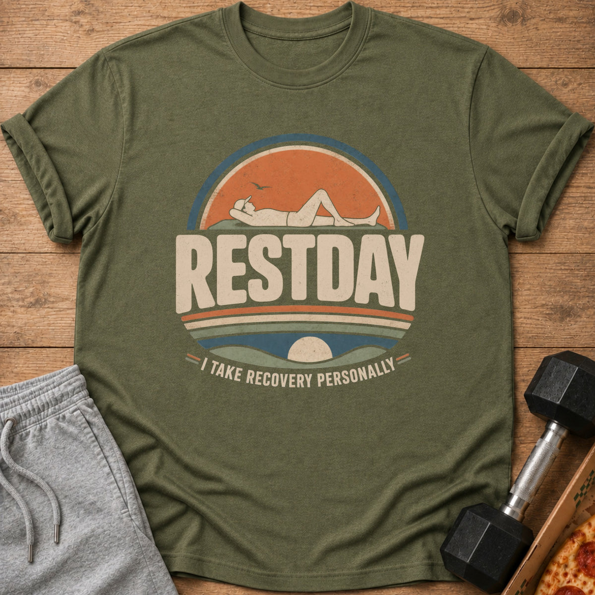 Green t-shirt with "RESTDAY" text and reclining person graphic.